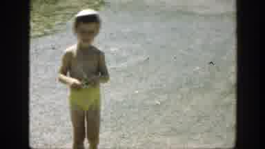 Connecticut (1947): Blonde Girl In Yellow Bikini And Sunglasses Walking On A Sunny