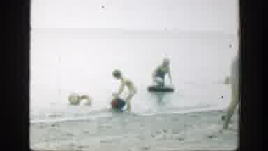Connecticut (1947): Family Members Spending Time At The Beach Some In Water And