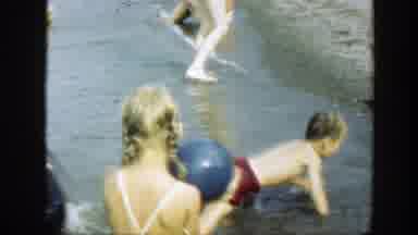 Connecticut (1947): Kids Playing Together On A Sunny Day At The Beach With Gentle