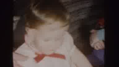 Nebraska (1955): Family Gathered In The Room And Child On The Floor With A Woman