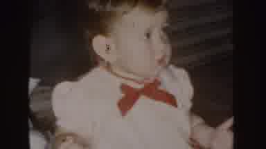 Nebraska (1955): Young Toddler Looking Around And Putting His Hands On His Face