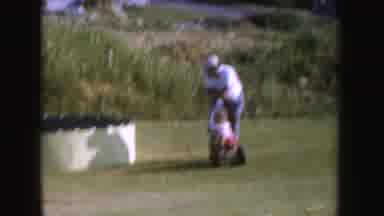 Nebraska (1955): Teaching The Baby To Ride The Bike In The Summer Garden With A