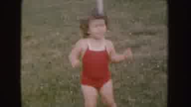Nebraska (1955): Woman And Child Playing With Baby On The Lawn Drinks Getting Up