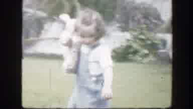 Florida (1945): Young Girl Wearing A Jumper Holding A Stuffed Toy Walking And