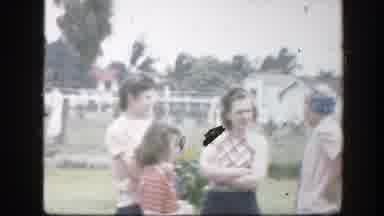 Florida (1945): People Speak Together And Enjoy At A Party Held Outside A Home