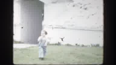 Florida (1945): Kid Has Fun With His Teddy Bear In The Garden