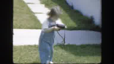 Florida (1945): Little Girl Playing With A Purse In Her Backyard Of Home On A