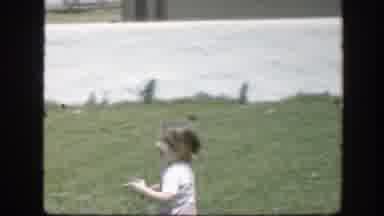 Florida (1945): Child And Mother Playing In Their Backyard Of Home On A Summer Day