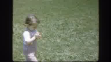 Florida (1945): Small Child Walking Through A Field Near Several Holiday Houses