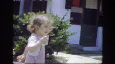 Florida (1945): Little Girl Walking In The Yard With A Glass Of Water With Her Dad