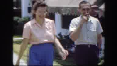 Florida (1945): Couple Walking On The Sidewalk And Child Playing On The Lawn