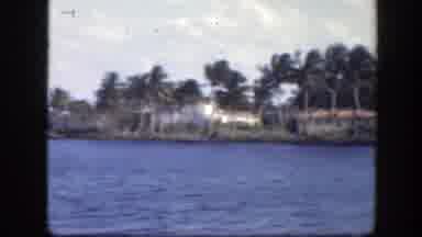 Florida (1945): Homes And Palm Trees Line The Banks Of A Channel With A Strong