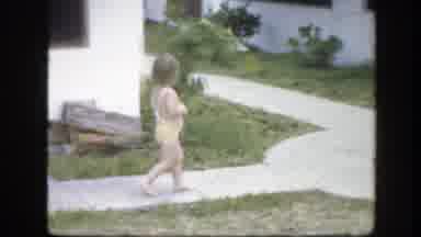 Florida (1945): Baby Girl Walking Down Sidewalk In Her Swimsuit Looking For