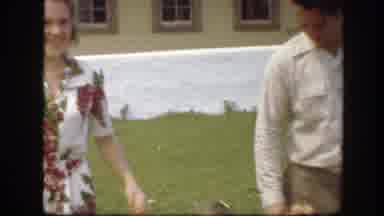 Florida (1945): Couple Holds Hand Of Girl Wearing White Dress While Walking Across