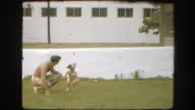 Florida (1945): Man Wearing White Shorts Runs With Girl Wearing Yellow Swimwear
