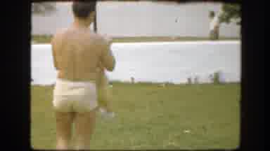 Florida (1945): Dad And Daughter Playing On The Grass