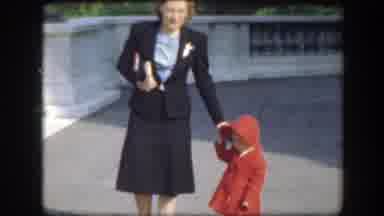 Florida (1945): Lady Goes Downstairs Holding The Hand Of A Kid Who Wears A Red