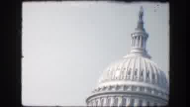 Washington DC (1945): A Big White Building With A Huge Dome In A City And A Parked