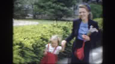 Washington DC (1945): Woman Wearing Black Suit Walks Holding Hand Of Small Girl