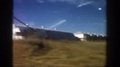 Aspen Colorado (1961): Driving By Grassy Road View With Farm Buildings