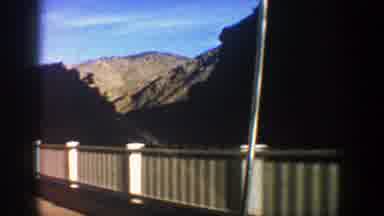 Aspen Colorado (1961): View Of White Stone Bridge Green Trees And Blue Sky On A