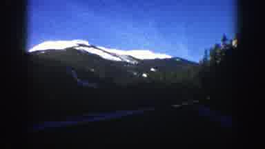 Aspen Colorado (1961): Snowy Mountains Registered From Car Driving In The Road In