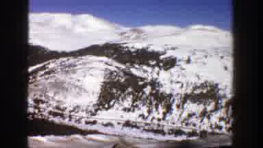 Aspen Colorado (1961): In A Landscape Beautiful Mountain Ranges Covered With Snow