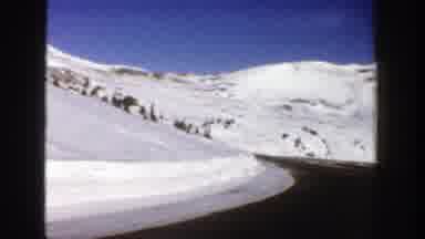 Aspen Colorado (1961): Driving On Dirt Track In Snow-Covered Mountain