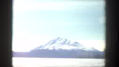 Aspen Colorado-1961: View Of Snow Covered Mountain And Blue Sky On A Cloudy Day