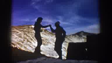 Aspen Colorado (1961): Two Person Walking On The Top Of A Snowy Mountain