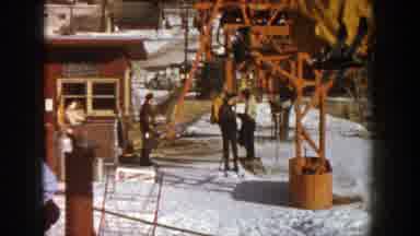 Aspen Colorado (1961): Ski Resort Staff Helping People On The Cable Car Structure
