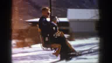 Aspen Colorado (1961): Ski Station Employee Helping People To Climb The Lift