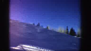Aspen Colorado (1961): Steep Snow Covered Hill With Trees And Mountains In The