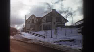 Aspen Colorado (1961): Driving Through A Rural Mountain Town During A Snowy