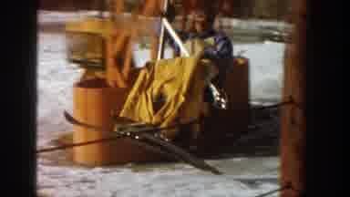 Aspen Colorado (1961): Ski Station Employee Helping People On Cable Car