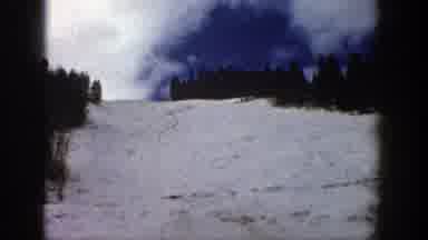 Aspen Colorado (1961): View Of Snow Covered Mountain Slope Trees And Blue Sky On A