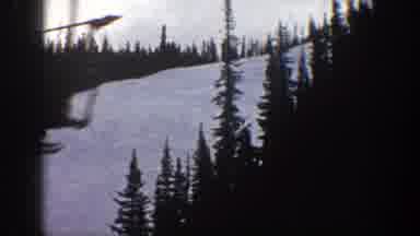 Aspen Colorado (1961): A Ski Lift Runs Next To A Snow Covered Ski Run That Cuts