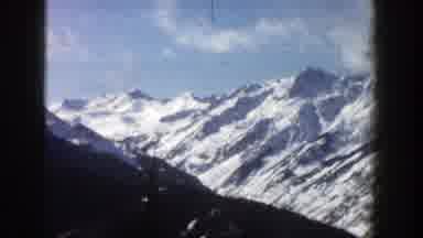 Aspen Colorado (1961): Snow Capped Mountain Range In The Clouds And Blue Sky