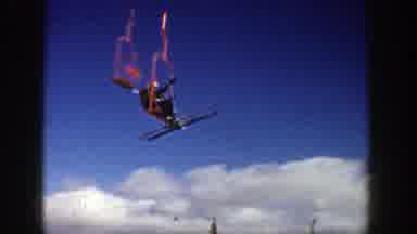 Aspen Colorado (1961): People Riding On Ski Lift And Skiing On The Slopes On Sunny