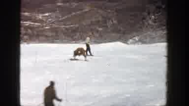 Aspen Colorado (1961): Male Skier Maneuvering Snow-Packed Slopes While Another