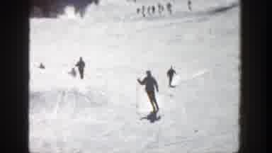 Aspen Colorado (1961): A Family Skiing Down A Large Mountain With Strong Winds