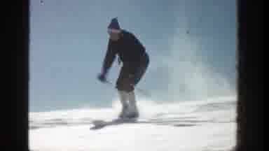 Aspen Colorado (1961): Person Wearing Black Jacket Skis Briefly Then Stops On A