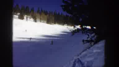 Aspen Colorado (1961): Group Of Skiers Playing Follow The Leader As They Descend