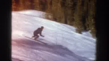 Aspen Colorado (1961): Man Skiing In The Snow Doing Some Maneuvers And Going Down