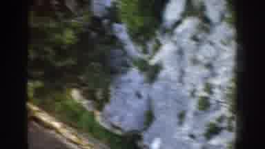 Italy (1960): Aerial View Of Ground Below Showing Trees Road And Snow