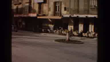 Italy (1960): Observing A Square Where Several Vesta Motorcycles And A Car With A