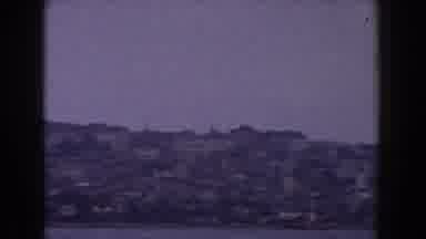 Italy (1960): A Far City With A Lot Of Birds In The Cloudy Sky