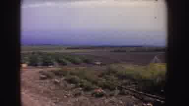 California (1962): A Very Big Land Occupied By Fields And An House On The Left