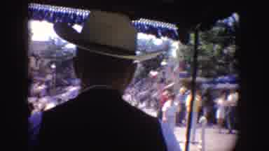 California (1962): Man Riding A Horse-Drawn Cart On A Street Passing Several