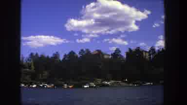 Stockholm Sweden (1975): Driving On A Beautiful Yet Partly Cloudy Day Along A Body